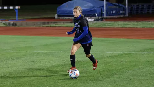 Madison Williams playing soccer