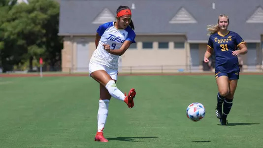 Liliana Fernandez playing soccer