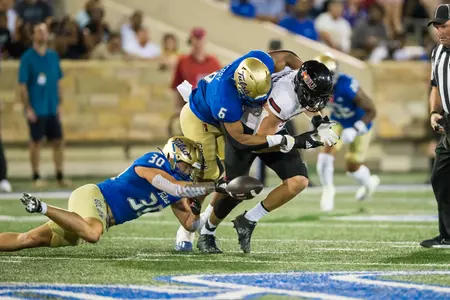 Tulsa Golden Hurricane linebacker Jon-Michael Terry (6) and Tulsa Golden Hurricane linebacker Justin Wright (30) BRETT ROJO/For the University of Tulsa