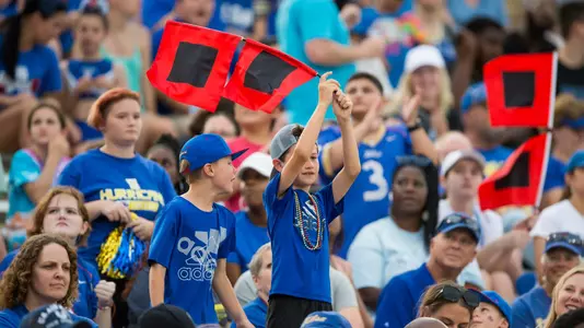 youth fans with flag