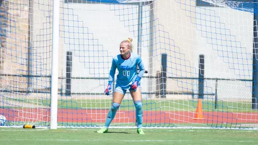 Tatum Sanders playing soccer