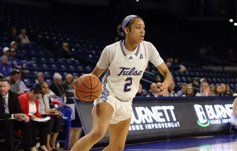 Temira Poindexter playing basketball