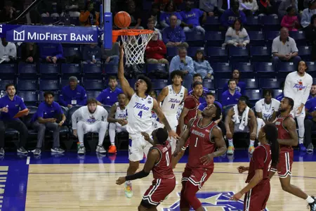 Guard #4 PJ Haggerty / Tulsa vs New Mexico State on Dec. 22, 2023 in the Donald W. Reynolds Center