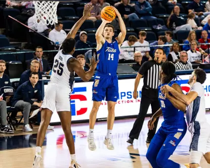 Miles Barnstable shoots against Oral Roberts