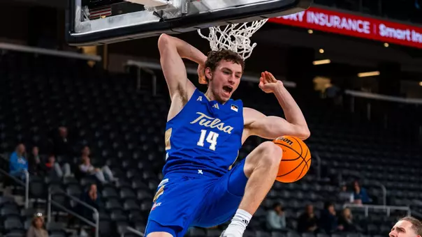 Miles Barnstable celebrates a dunk against San Jose State