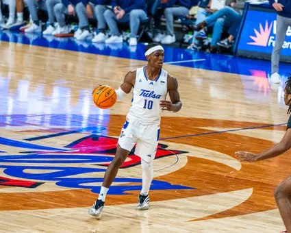 Tylen Riley looks to drive against UAPB