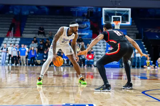 David Green scans the defense against Denver