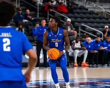 Ade Popoola looks to shoot against San Jose State