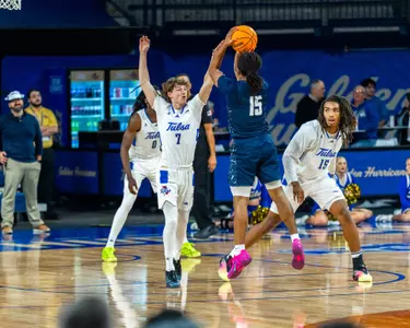 Cal Conroy closes out defensively against Manhattan Christian