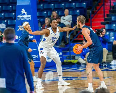 Ian Smikle defends the ball