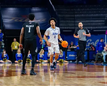 Jaylen Lawal dribbles up the court