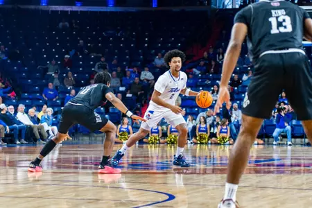 Jaylen Lawal looks to drive against Missouri State