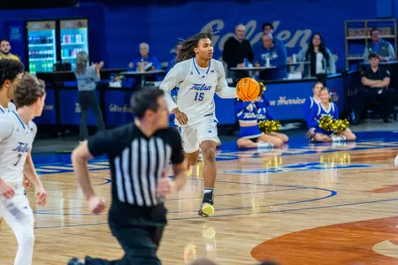 KJ Martin Jr. dribbles up the court