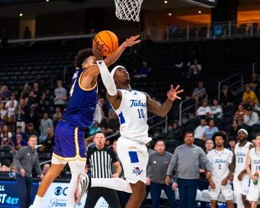 Tylen Riley goes up and under against Northern Iowa