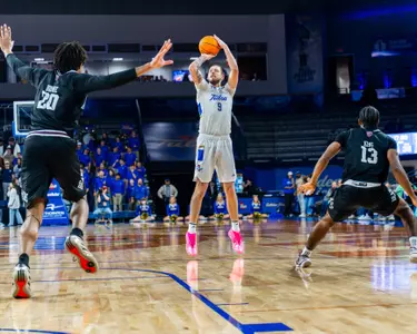 Tyler Behrend shoots against Missouri State