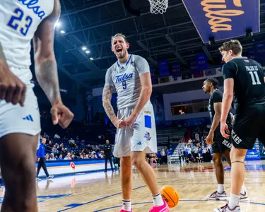 Tyler Behrend flexes against Missouri State