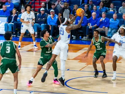 David Green attempts a layup against USF
