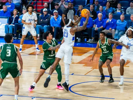 David Green attempts a layup against USF