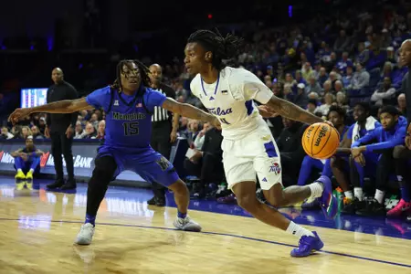 Myles Rigsby drives against Memphis