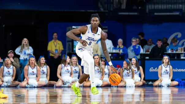 Ade Popoola dribbles up the floor against Memphis