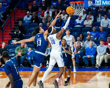 Tylen Riley goes for a layup against Rice