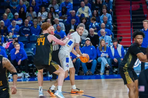 Tyler Behrend looks to pass against Wichita State