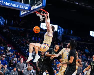 Miles Barnstable throws down a dunk against UAB