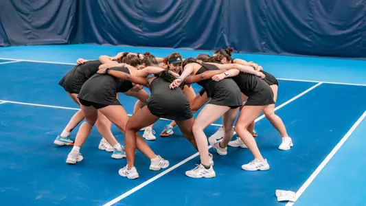 Women's tennis team cheer