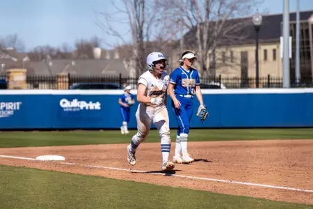 Amber Turner jogs home to score the winning run against SDSU