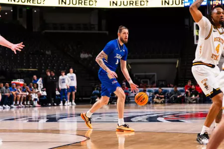 Tyler Behrend dribbles the ball against Wichita State in the American Conference semifinals
