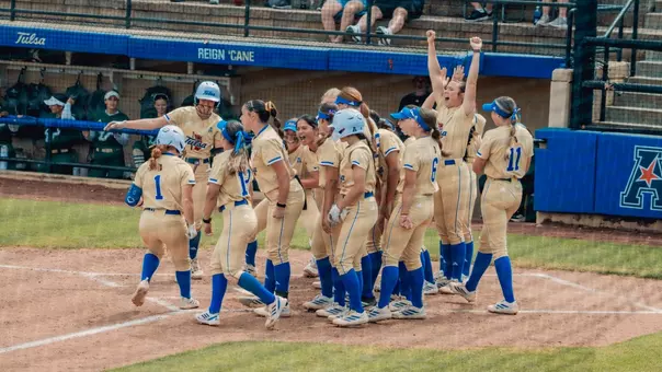 Maci Cole celebrates a go-ahead home run against South Florida