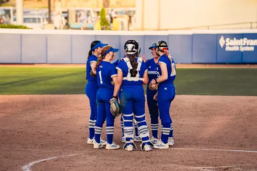 Tulsa huddles in the circle against Oklahoma State