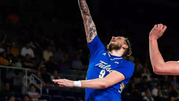 Tyler Behrend makes a layup against ECU