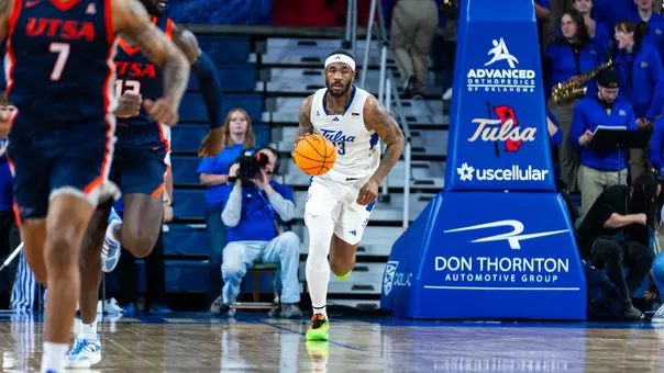 David Green dribbles up the court against UTSA