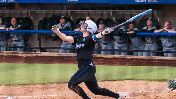 Maci Cole swings at a pitch against UAB