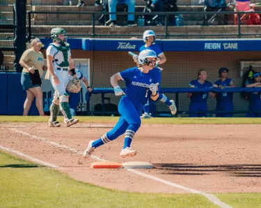 Maci Cole rounds the bases against South Florida