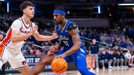 David Green drives to the basket against Auburn