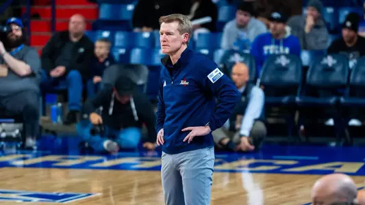 Eric Konkol coaches Tulsa
