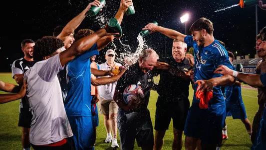 Coach McIntosh 300 win celebration