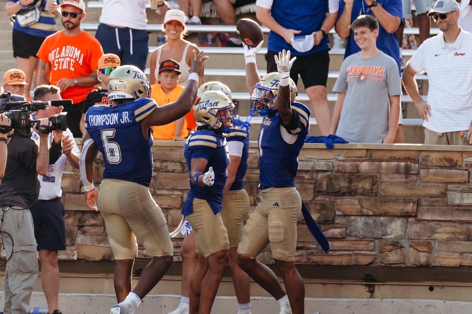 Zach Williams celebrates an interception against Oklahoma State
