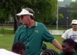 UAB Coach Watson Brown speaks to his new players following Satursday afternoon's workout