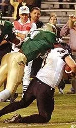 Chris Brown pushes a Southern Miss. player out of bounds just short of the goal line.