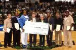 A group of former UAB football players was on hand at Saturday's basketball game to present a generous gift to UAB Athletics.