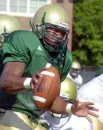 Quarterback Darrell Hackney and his teammates opened 2003 fall practice Tuesday.