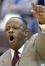 Mike Anderson leads the UAB Blazers to the floor Saturday for the season-opener. (AP Photo/Al Behrman)