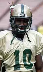 UAB's All American receiver, Roddy White, gets into the holiday spirit after a UAB football practice at Aloha Stadium.