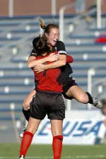 Jenny Rynders and Katie Forbis celebrate after the Blazers edged Saint Louis, 2-1, to win the C-USA Tournament title