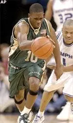 Mo Finley steals the ball from Memphis' Antonio Burks during the first half.