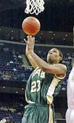 Demario Eddins drives the lane and goes up for a lay-in on his way to scoring 26 points.