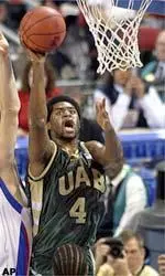 Gabe Kennedy gets inside to put up a shot during the first half.